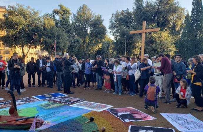 People gathered to meditate on the Way of the Cross in Rome, during the Oct. 6-27 Synod of Bishops on the Amazon. (Ines San Martin/Crux)