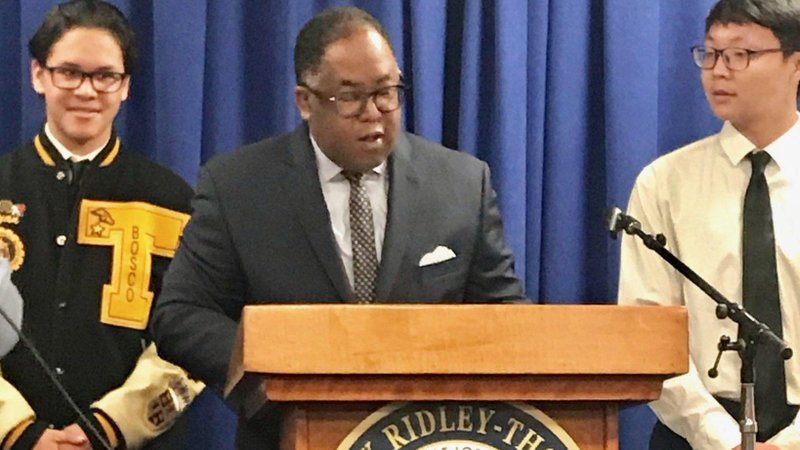 Supervisor Mark Ridley-Thomas presents awards to two Bosco Tech students. (Photo courtesy Bosco Tech)