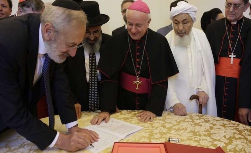 Representatives of the Abrahamic religions sign a declaration on end-of-life issues at the Vatican Oct. 28, 2019. (Vatican Media via CNA)