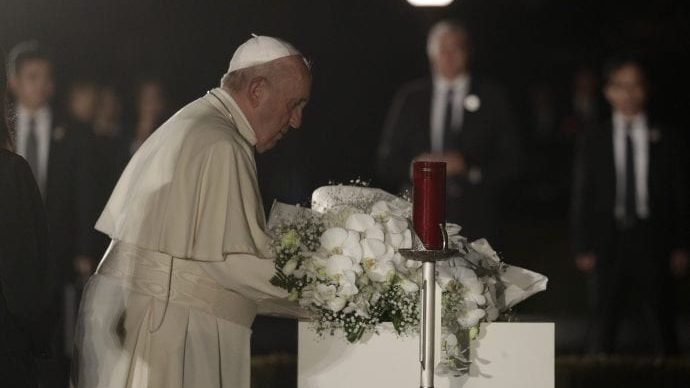 Pope Francis lays flowers during a visit to Hiroshima Peace Memorial Park in Hiroshima, western Japan, Sunday, Nov. 24, 2019. (Gregorio Borgia/AP via Crux)