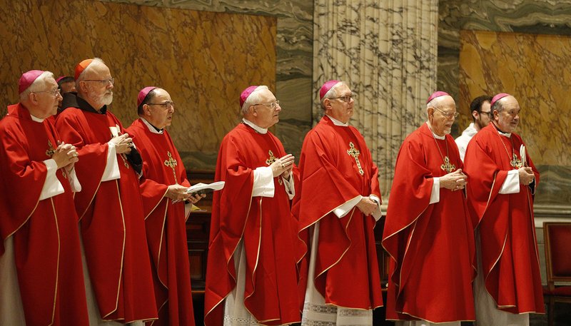 U.S. bishops from the New England States concelebrate Mass at the Basilica of St. Paul Outside the Walls in Rome Nov. 5, 2019. The bishops were making their "ad limina" visits to the Vatican to report on the status of their dioceses to Pope Francis and Vatican officials. (CNS photo/Carol Glatz)
