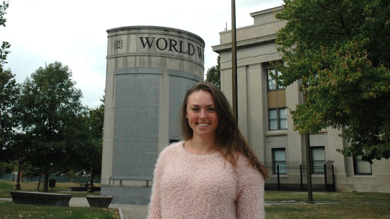 Standing near a World War II memorial in downtown Indianapolis, Sophia Egold knows the difference that veterans have made in her life and the life of the United States. In November 2013, Sophia was part of a school-wide letter-writing project at St. Barnabas School to recognize the World War II veterans of the 95th Bomb Group. Sophia drew the name of Frank Barbour, a Boston native who joined the Army Air Corps at the beginning of the war and became a decorated B-17 pilot by its end. (CNS photo/John Shaughnessy, The Criterion)