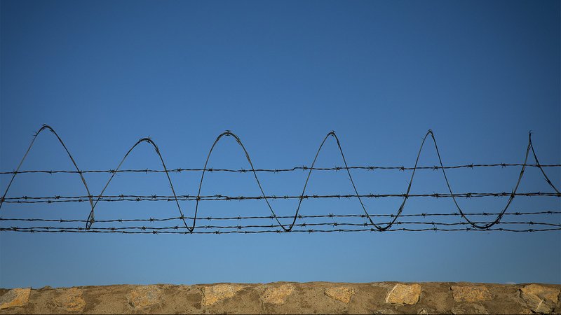 A border fence is seen Sept. 24, 2019, between El Paso, Texas, and Ciudad Juarez, Mexico. Meeting in Baltimore for their fall general assembly, the U.S. bishops heard a grim report Nov. 12 on the policy landscape facing immigrants and refugees trying to find shelter in the United States. (CNS photo/Tyler Orsburn)