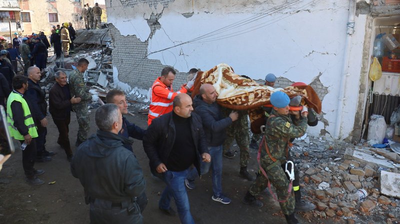 Military and emergency personnel carry an injured man following a magnitude 6.4 earthquake in Thumane, Albania, Nov. 26, 2019. "I would like to send my greetings and my closeness to the dear people of Albania who have suffered so much in these days," Pope Francis said Nov. 27 before concluding his weekly general audience at the Vatican. (CNS photo/Florion Goga, Reuters)