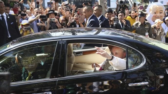 Pope Francis waves as he arrives at Apostolic Nunciature Embassy of the Holy See in Bangkok, Thailand, Wednesday, Nov. 20, 2019. Pope Francis arrived in Bangkok on Wednesday to begin a tour of Thailand and Japan, part of a mission to boost the morale of those countries’ tiny minority Catholic communities and to speak about issues of concern including human trafficking and peacemaking. (Manish Swarup/AP via Crux)