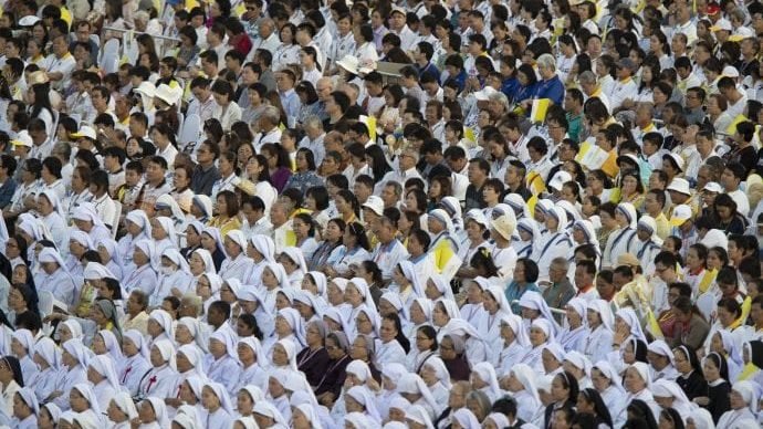 Catholics await Pope Francis before a Holy Mass at National Stadium in Bangkok, Thailand, Thursday, Nov. 21, 2019. (Sakchai Lalit/AP via Crux)