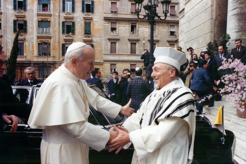 Pope John Paul II greets Rabbi Elio Toaff at Rome’s main synagogue April 13, 1986. The meeting marked the beginning of a new era in Catholic-Jewish relations. It was the first time a pope had entered the Rome synagogue. (CNS photo/Arturo Mari, L'Osservatore Romano)