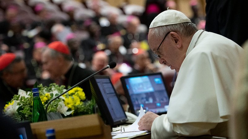 Pope Francis reviews papers Feb. 23, 2019, the third day of a meeting on the protection of minors in the church at the Vatican. For Pope Francis, 2019 included his sixth anniversary as pope, his 83rd birthday and his 50th anniversary as a priest, but it also was a year that saw him still confronted with the clerical sexual abuse crisis and with Vatican financial scandals. (CNS photo/Vatican Media)