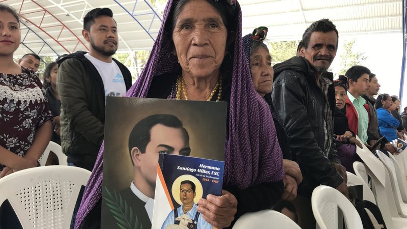 A woman attends the the Dec. 7, 2019, beatification Mass of Blessed James Miller in Huehuetenango, Guatemala. (CNS photo/CNS photo/David Agren )