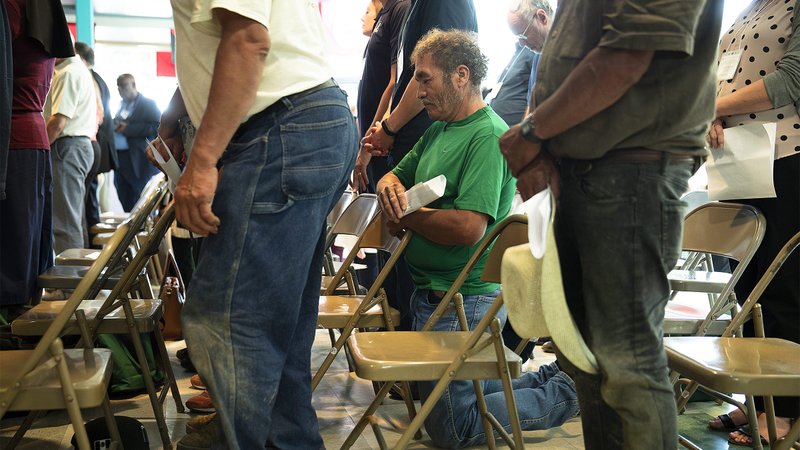 Farmworkers attend Mass at the Centro Sin Fronteras in El Paso, Texas, Sept. 25, 2019. The Mass was part of a pastoral encounter by U.S. bishops with migrants at the border. Two bishops who chair committees for the U.S. Conference of Catholic Bishops applauded the passage of the Farm Workforce Modernization Act of 2019 (H.R. 5038).(CNS photo/Tyler Orsburn)