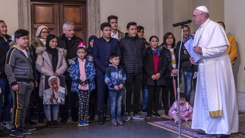 Pope Francis meets with recently arrived refugees from the Greek island of Lesbos at the Vatican Dec. 19, 2019. The pope met 33 refugees and migrants who had arrived in Rome two weeks ago. (CNS photo/Stefano Dal Pozzolo)