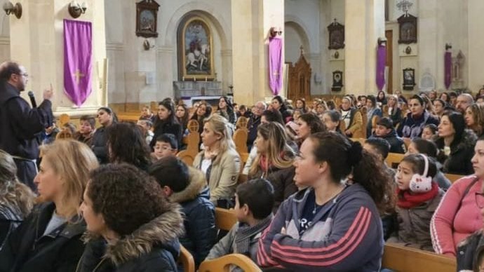 Father Ibrahim Alsabagh speaks to his community in the Latin Parish of St. Francis in Aleppo, Syria. (Courtesy of Latin Parish of St. Francis via Crux)