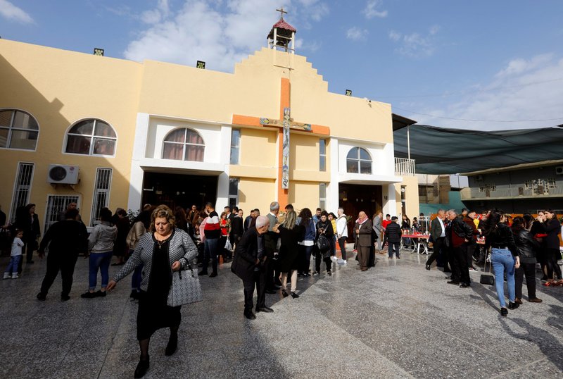 Iraqi Christians in Baghdad leave Christmas Mass at St. George Chaldean Church Dec. 25, 2019. (CNS photo/Khalid al Mousily, Reuters)