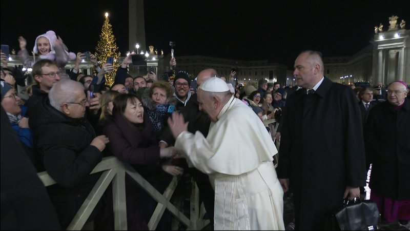 Pope Francis slaps a woman's hand after she grabbed his hand while walking to visit the Nativity scene in St. Peter's Square at the Vatican Dec. 31, 2019. At his Angelus Jan. 1 the pope apologized for the "bad example" he gave when he slapped the hand of the woman. (CNS photo/Vatican Media)