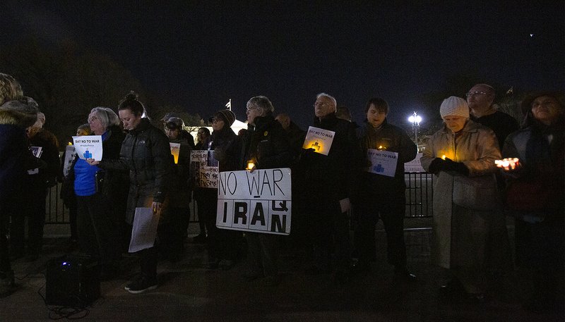 People gathered Jan. 6, 2020 near the White House in Washington during a candlelight vigil to call for peaceful solutions to rising tensions between the United States and Iran. (CNS photo/Tyler Orsburn)