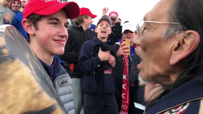 Nick Sandmann, a junior at the time at Covington Catholic High School in Park Hills, Ky., and other students from the school stand in front of Native American Nathan Phillips near the Lincoln Memorial in Washington in this still image from video Jan. 18, 2019. (CNS photo/Kaya Taitano, social media via Reuters)