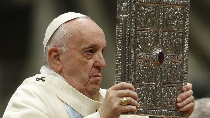 Pope Francis holds the Book of the Gospels as he celebrates Mass on the feast of Mary, Mother of God, in St. Peter's Basilica at the Vatican Jan. 1, 2020. The pope has established the third Sunday in Ordinary Time as "Sunday of the Word of God." It will be celebrated for the first time Jan. 26. (CNS photo/Paul Haring)