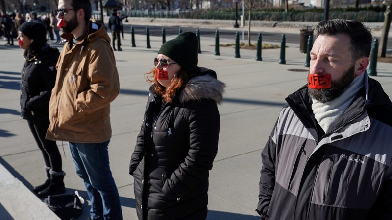 Pro-life advocates stand outside the U.S. Supreme Court in Washington Jan. 22, 2020, the anniversary of the 1973 U.S. Supreme Court decision that legalized abortion across the nation. In a survey of 1,237 adults conducted Jan. 7-12 by the Marist Poll at Marist College under the sponsorship of the Knights of Columbus, respondents said they would welcome limiting abortion so that it can be performed only during the first three months of pregnancy. (CNS photo/Sarah Silbiger, Reuters)