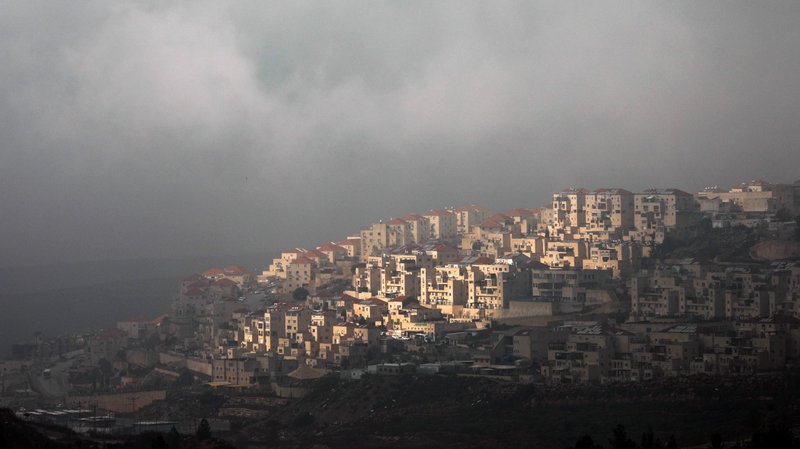 Clouds frame a section of the Israeli settlement of Beitar Illit in the Israeli-occupied West Bank Jan. 29, 2020. (CNS photo/Amir Cohen, Reuters)