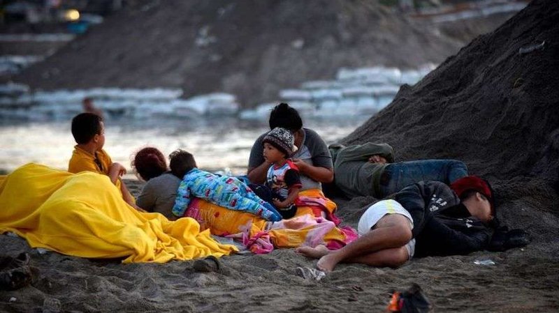 Central American migrants in a caravan headed toward the United States Jan. 21, 2010. (Johan Ordonez/AFP/Getty Images via CNA)