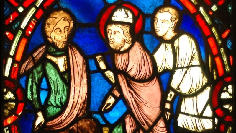 St. Blaise confronting the Roman governor: Scene from the life of St. Blaise. Stained glass window from the area of Soissons (Picardy, France), early 13th century.