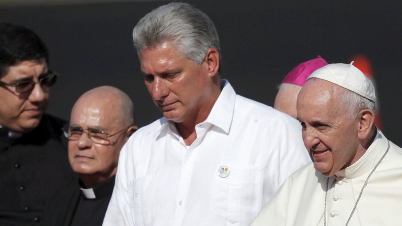 Pope Francis walks with then-First Vice President Miguel Mario Diaz-Canel Bermudez of Cuba after arriving in Holguin, Cuba, Sept. 21, 2015. New York Cardinal Timothy M. Dolan is set to meet with Diaz-Canel, who is now president, during a Feb. 7-12, 2020, trip to the island nation, which includes a visit with the cardinal of Havana and other Cuban prelates. (CNS photo/Andres Martinez Casares, Reuters)