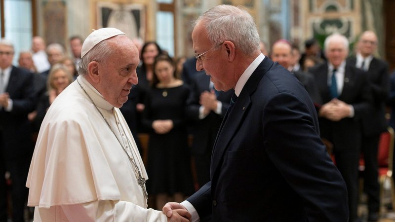 Pope Francis greets Supreme Knight Carl A. Anderson of the Knights of Columbus during an audience with a delegation from the Knights at the Vatican Feb. 10, 2020. Members of the Knight's board of directors were in Rome to celebrate the 100th anniversary of the organization's active presence in Rome. (CNS photo/Vatican Media)