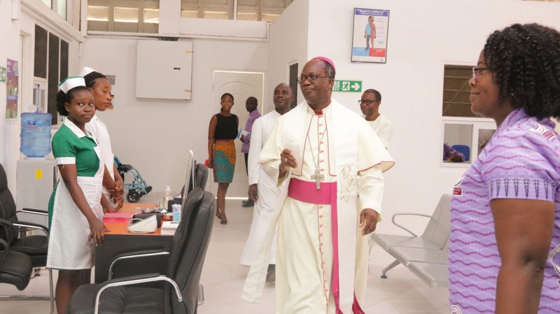 Bishop Emmanuel Kofi Fianu of Ho, who is in charge of health issues for the Ghana Catholic Bishops' Conference, blesses the St. Pauline Clinic with holy water after commissioning it in Accra Feb. 7, 2020. The clinic was built by Novo Nordisk, a Danish global health care company and world leader in diabetes care, in partnership with the National Catholic Health Service. (CNS photo/Damian Avevor)