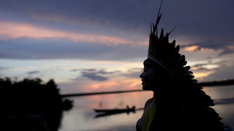 A leader of the Celia Xakriaba peoples walks along the banks of the Xingu River in Brazil's Xingu Indigenous Park Jan. 15, 2020. (CNS photo/Ricardo Moraes, Reuters)