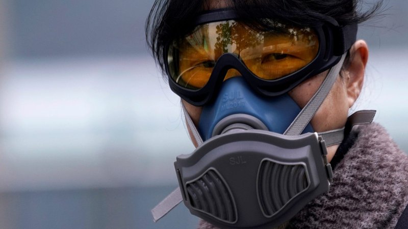 A woman wearing a mask is seen at a subway station in Shanghai Feb. 13, 2020, as the country is hit by an outbreak of the coronavirus. Around the world, people are paying close attention to the coronavirus, which has infected more than 64,000 people and killed at least 1,383 as of Feb. 14. (CNS photo/Aly Song, Reuters)