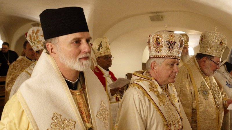 Bishops of the Eastern Catholic churches in the United States concelebrate a Divine Liturgy in the crypt of St. Peter's Basilica at the Vatican Feb. 18, 2020. Pictured from left are Archbishop Borys A. Gudziak of the Ukrainian Archeparchy of Philadelphia; Archbishop William C. Skurla of the Byzantine Catholic Archeparchy of Pittsburgh; and Bishop John M. Botean of the Romanian Catholic Eparchy of St George's in Canton, Ohio. The bishops were making their "ad limina" visits to the Vatican to report on the status of their dioceses to Pope Francis and Vatican officials. (CNS photo/Paul Haring)