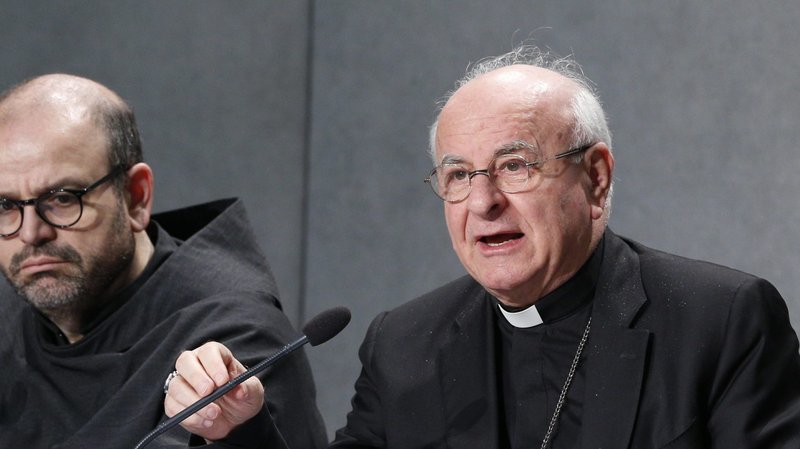 Archbishop Vincenzo Paglia, president of the Pontifical Academy for Life, speaks during a news conference at the Vatican Feb. 25, 2020. Also pictured is Franciscan Father Paolo Benanti, a professor at the Pontifical Gregorian University and specialist in digital ethics. Speakers previewed a Feb. 26-27 workshop and assembly of the Pontifical Academy for Life on artificial intelligence. (CNS photo/Paul Haring)