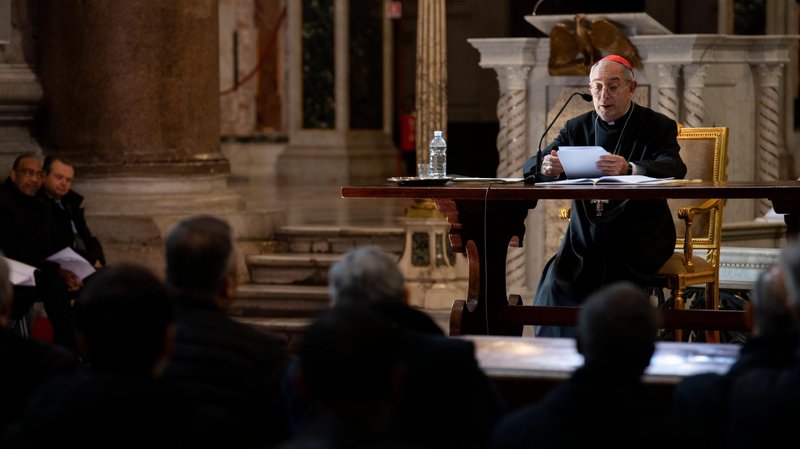 Cardinal Angelo De Donatis, papal vicar of Rome, reads Pope Francis' speech during a meeting with priests at the Basilica of St. John Lateran in Rome Feb. 27, 2020. Pope Francis was unable to attend the traditional Lenten penitential service due to a mild cold. (CNS photo/Vatican Media)