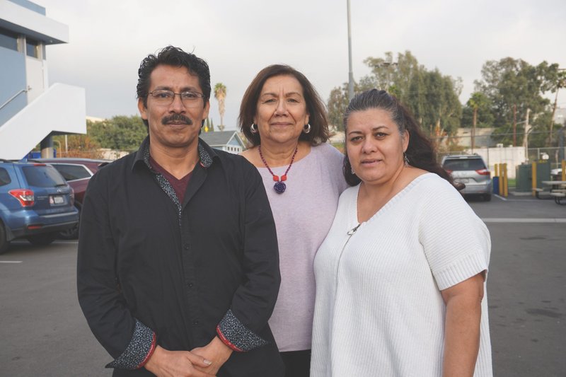 Tomas and Juanita Bonilla with Healing Hearts Restoring Hope executive director Consuelo Valdez (center). The Bonillas' daughter and granddaughter were murdered in 2010. (R.W. Dellinger)