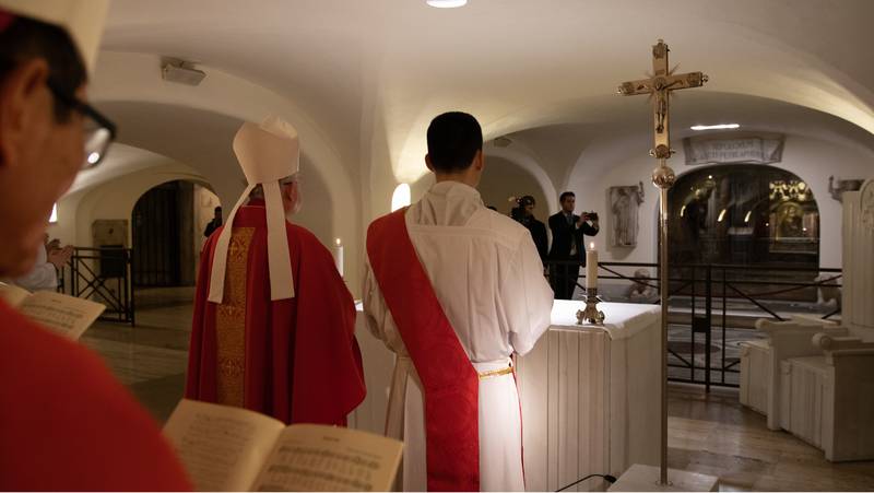 Archbishop José H. Gomez prays before the tomb of St. Peter at the end of Mass with the bishops of California, Nevada, and Hawaii Jan. 27, 2020. (Anthony Johnson)