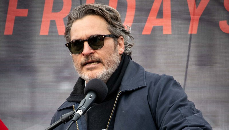 Joaquin Phoenix joined hundreds of protesters at Jane Fonda's final "Fire Drill Friday" protest demanding climate action Jan. 10. (Shutterstock)