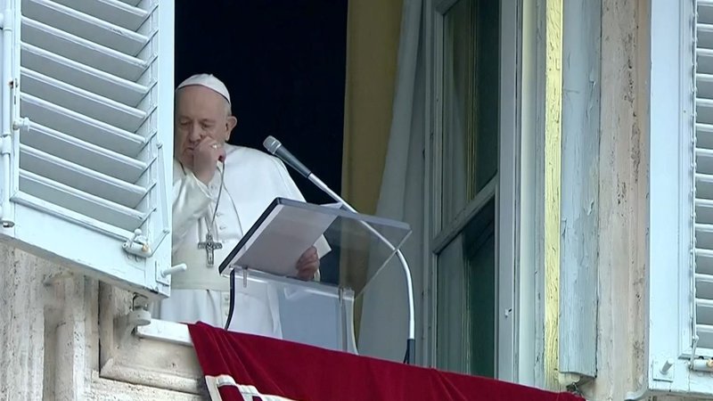 Pope Francis coughs as he leads the Angelus from the window of his studio overlooking St. Peter's Square at the Vatican March 1, 2020. (CNS photo/Vatican Media via Reuters)