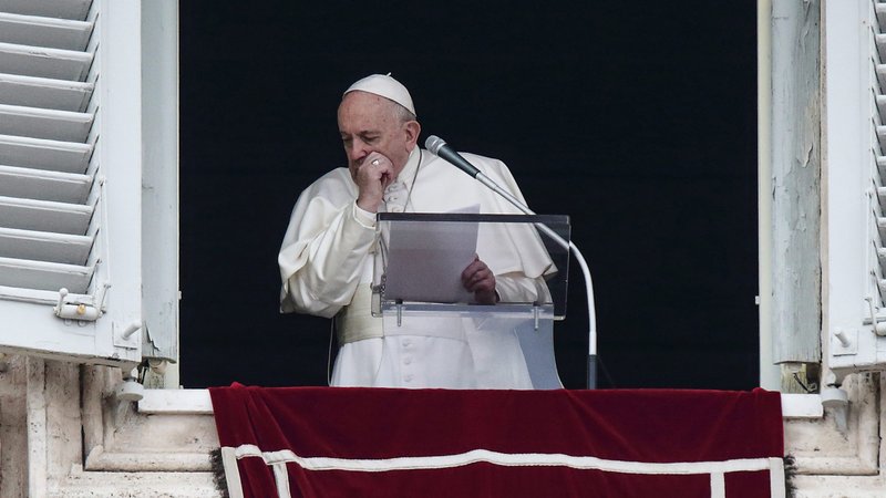 Pope Francis coughs as he leads the Angelus from the window of his studio overlooking St. Peter's Square at the Vatican March 1, 2020. (CNS photo/Reuters)