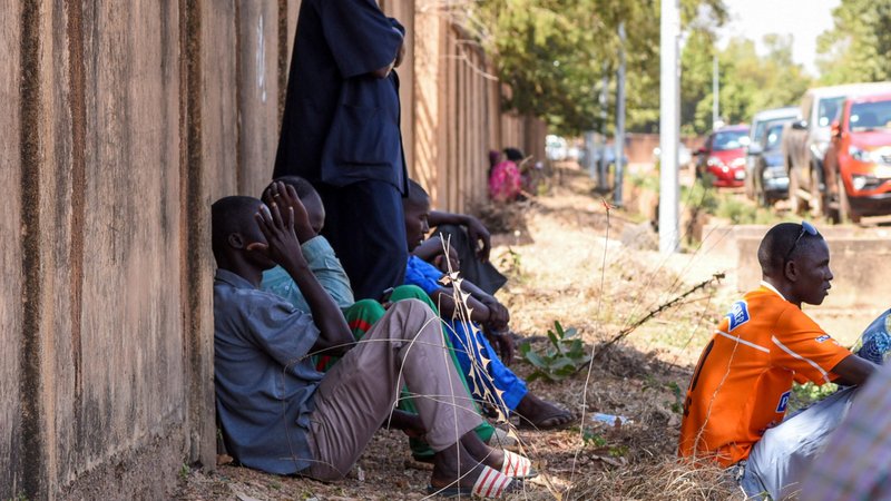 Relatives of victims of an attack wait outside a morgue in Ouagadougou, Burkina Faso, Nov. 8, 2019. Hundreds of thousands of people have been forced out of their homes in Burkina Faso as Christian communities are targeted in a spiral of Islamist killings. (CNS photo/Anne Mimault, Reuters)