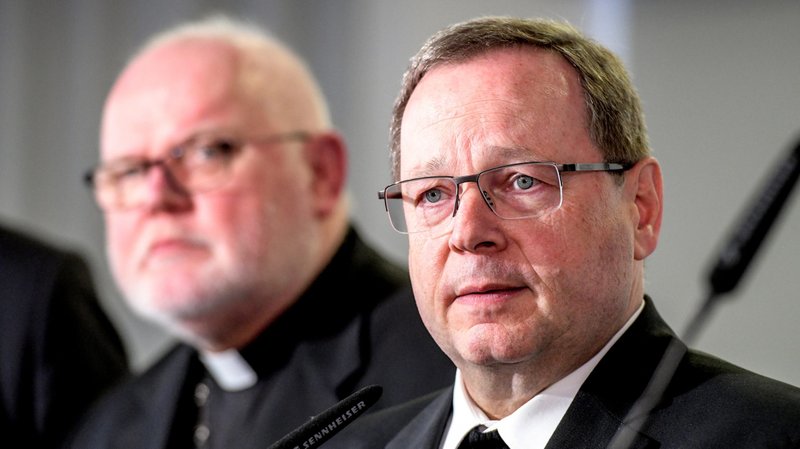 Limburg Bishop Georg Batzing speaks during a March 3, 2020, news conference in Mainz after being elected as the new president of the German bishops' conference. Bishop Batzing, regarded as an advocate of reforms in the Catholic Church, succeeds Cardinal Reinhard Marx, pictured at left. (CNS photo/Harald Oppitz, KNA)