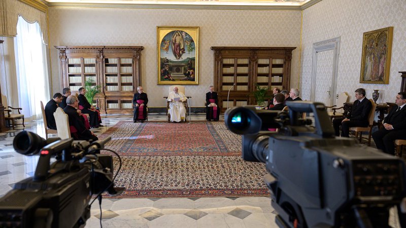 Pope Francis leads the general audience from his library in the Apostolic Palace at the Vatican March 11, 2020. With precautions continuing to combat the coronavirus, the audience went forward without the usual crowds but was broadcast live on television and streamed on the internet. (CNS photo/Vatican Media)