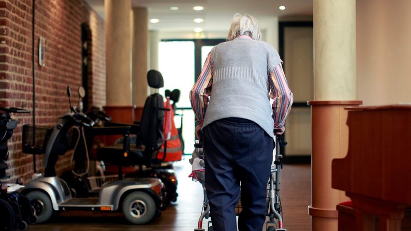 An elderly woman in Grevenbroich, Germany, walks through a corridor of a retirement home March 16, 2020. Pope Francis urged Christians March 17 to remember the elderly who are suffering not only loneliness but also fear due to the spread of the coronavirus. (CNS photo/Thilo Schmuelgen, Reuters)