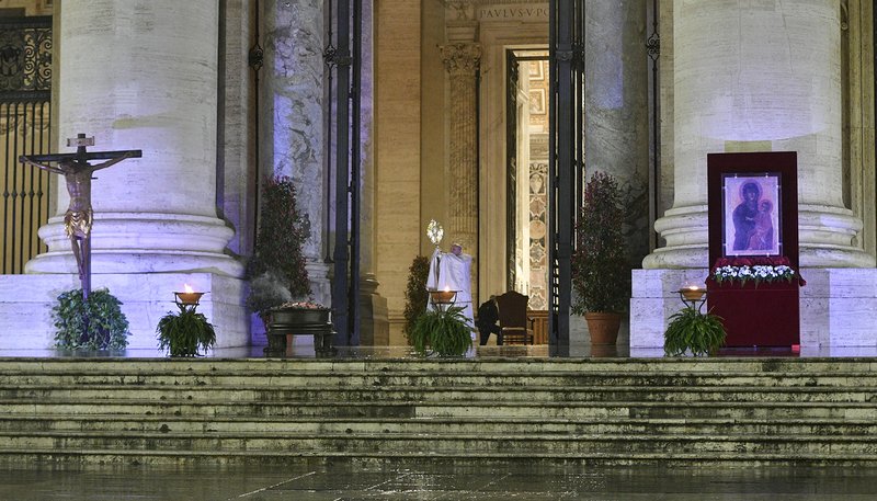 Pope Francis holds the monstrance as he delivers his extraordinary blessing "urbi et orbi" (to the city and the world) during a prayer service in the portico of St. Peter's Basilica at the Vatican March 27, 2020. The service was livestreamed in the midst of the coronavirus pandemic. (CNS photo/Vatican Media)
