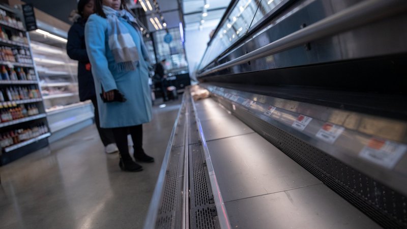 Empty shelves that usually contain meat products are seen in a New York City store March 16, 2020, following the outbreak of coronavirus. Bishop David A. Zubik of Pittsburgh is among U.S. bishops dispensing Catholics from the obligation to abstain from meat on Lenten Fridays with the exception of Good Friday. "As you are aware, many of the shelves and cases in our supermarkets are sparse if not empty. This is a time when pastoral necessity has informed my decision effective today," the bishop said. (CNS photo/Jeenah Moon, Reuters)