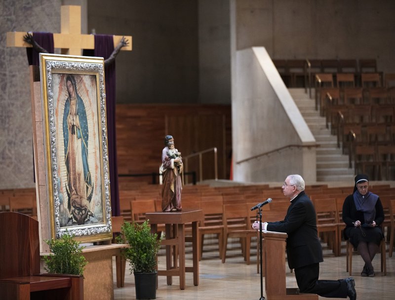 Archbishop José H. Gomez prays the rosary in an empty Cathedral of Our Lady of the Angels on March 19. LA Catholics were invited to follow the archbishop via livestream, in solidarity with Pope Francis’ request to faithful around the world to recite the rosary at 9 p.m. Rome time on the feast of St. Joseph to pray for those affected by the coronavirus (COVID-19) pandemic. (Victor Alemán)