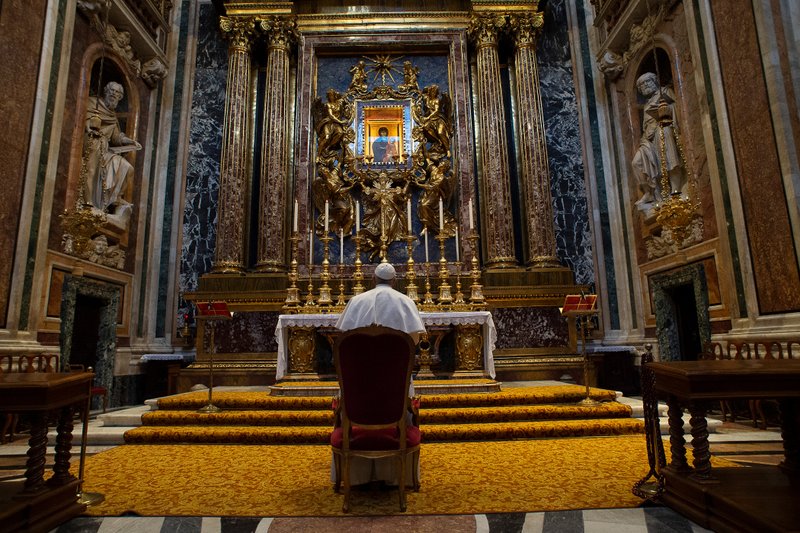 Pope Francis prays in front of the Marian icon "Salus Populi Romani" at the Basilica of St. Mary Major in Rome March 15. According to legend, late in the 6th century Pope Gregory I had the icon carried through the streets of Rome in prayer that the Black Plague would end, and in 1837, Pope Gregory XVI prayed before the image for an end to a devastating cholera outbreak. (Vatican Media)