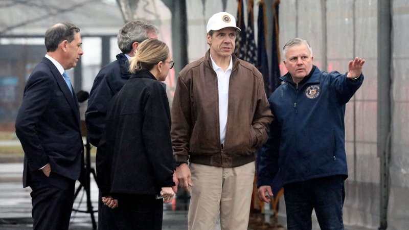 New York Gov. Andrew Cuomo is briefed about the state's first drive-through coronavirus mobile testing center in New Rochelle, N.Y., March 13, 2020, by Michael Kopy, who is New York state's director of emergency management. (CNS photo/Mark Vergari, The Journal News/USA Today via Reuters)