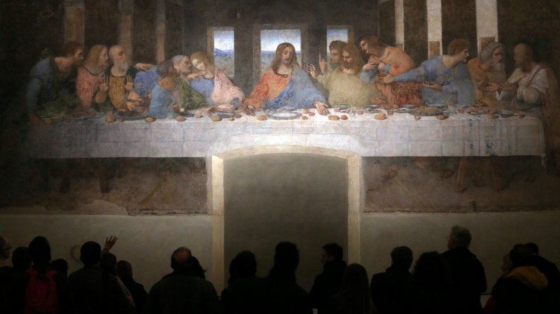 Visitors look at Leonardo da Vinci's "The Last Supper" on a refectory wall at Santa Maria delle Grazie Church in Milan, Italy, Nov. 16, 2016. (CNS photo/Stefano Rellandini, Reuters)