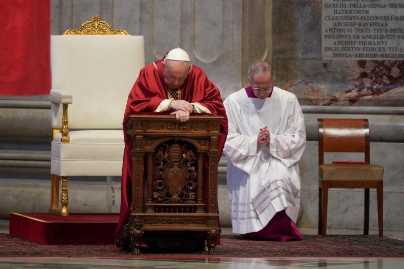 Pope Francis prays as he leads the Good Friday Liturgy of the Lord's Passion April 10, 2020, at the Altar of the Chair in St. Peter's Basilica at the Vatican. (CNS photo/Andrew Medichini, pool via Reuters)
