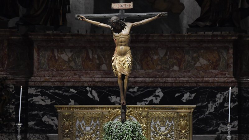 A crucifix is displayed during the Good Friday Liturgy of the Lord's Passion in St. Peter's Basilica at the Vatican April 10, 2020. (CNS photo/Vatican Media)